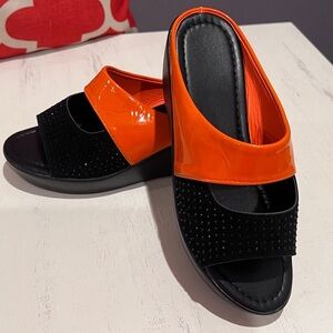 NWOT - Orange and Black Mule Sandals with Sleek Design
